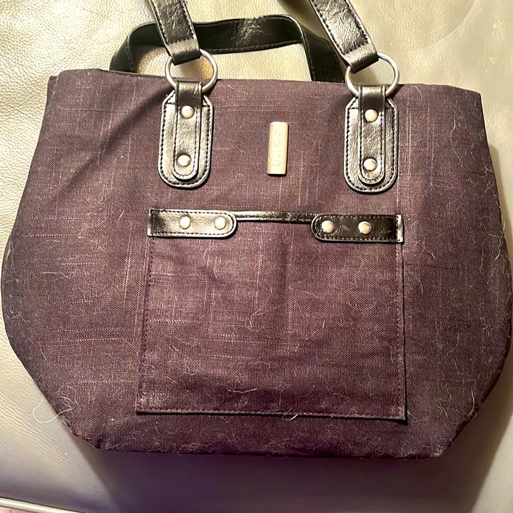 Double pocket one lined for easy cleaning purse